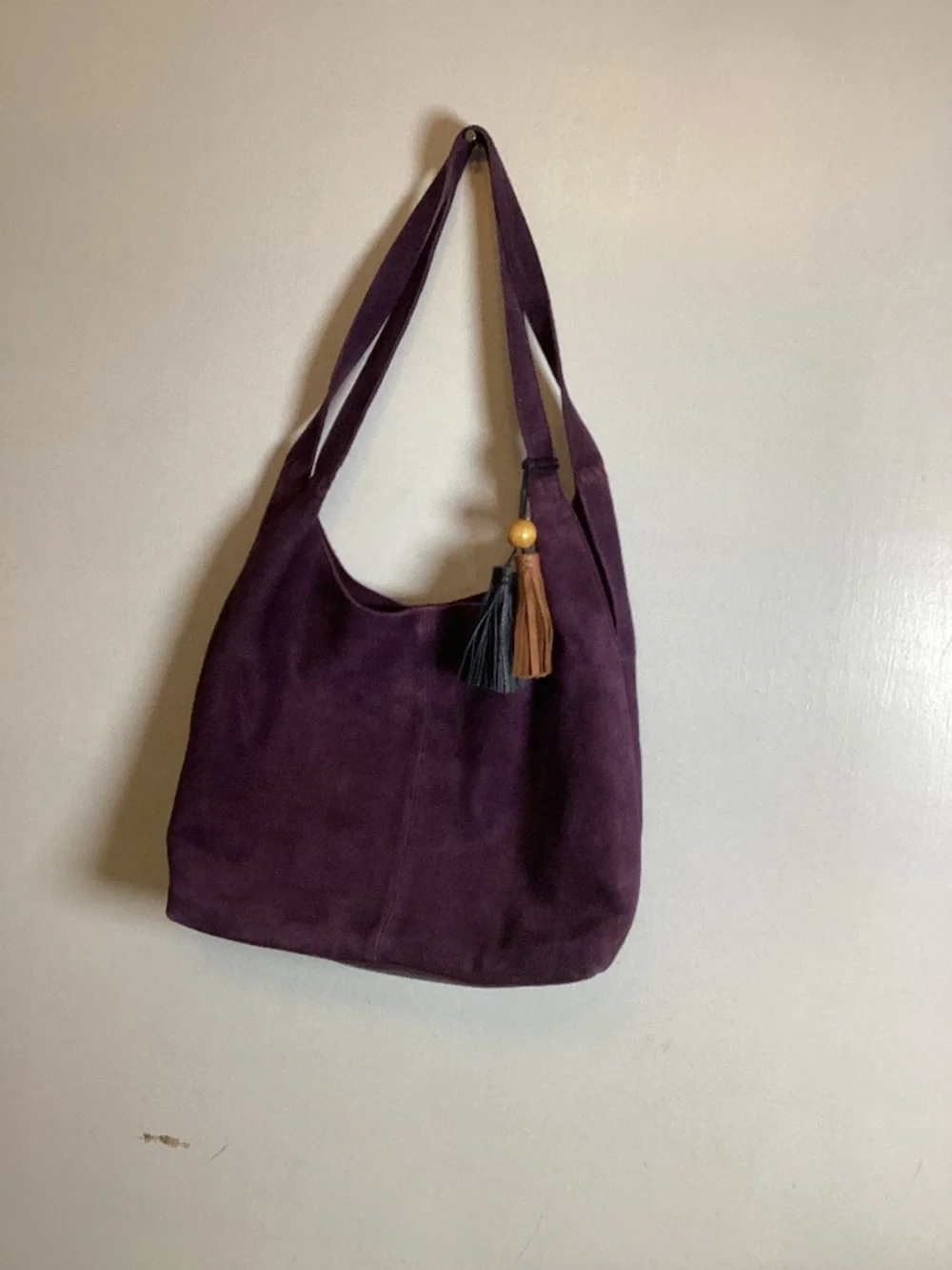 The Sak suede hobo with contrast tassels with wooden bead accent #boho # suede